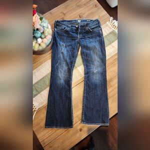 Distressed Blue Jeans